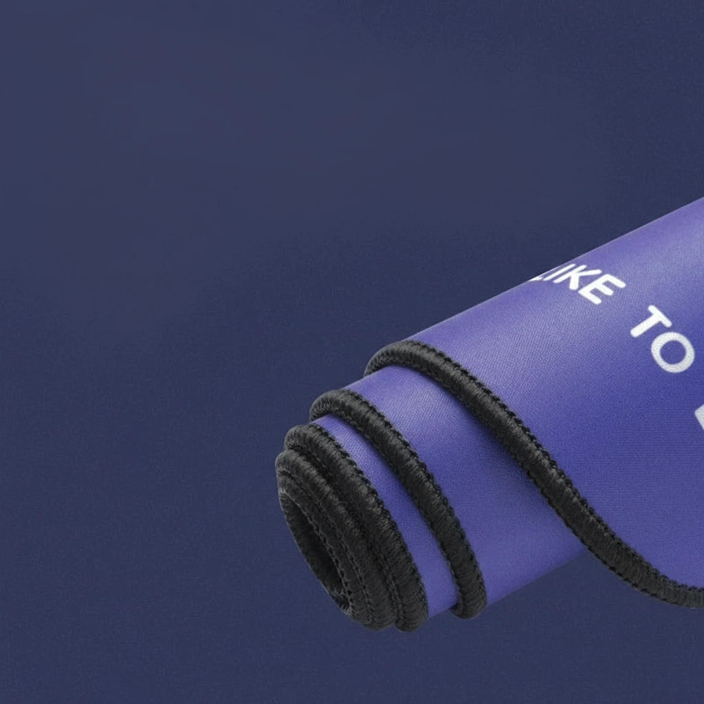 Blue mat with black edge on a dark blue background