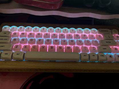 Keyboard with RGB lighting on a wooden desk