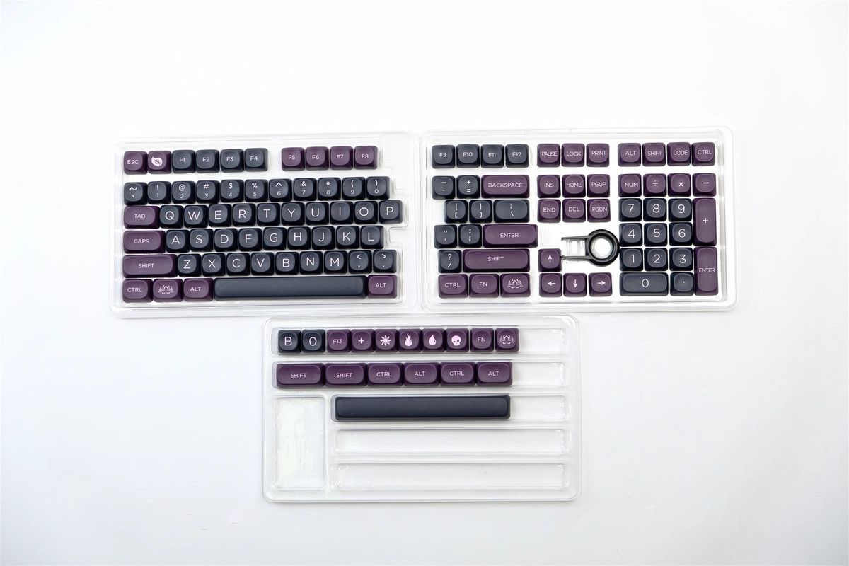 Mechanical keyboard with purple keys on a white background
