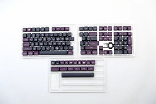 Mechanical keyboard with purple keys on a white background