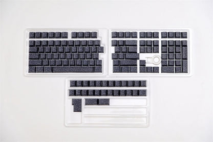 Black Ink Swirl Side Engraved Cherry keycaps on a white background