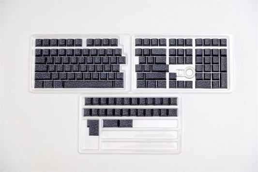 Black Ink Swirl Side Engraved Cherry keycaps on a white background