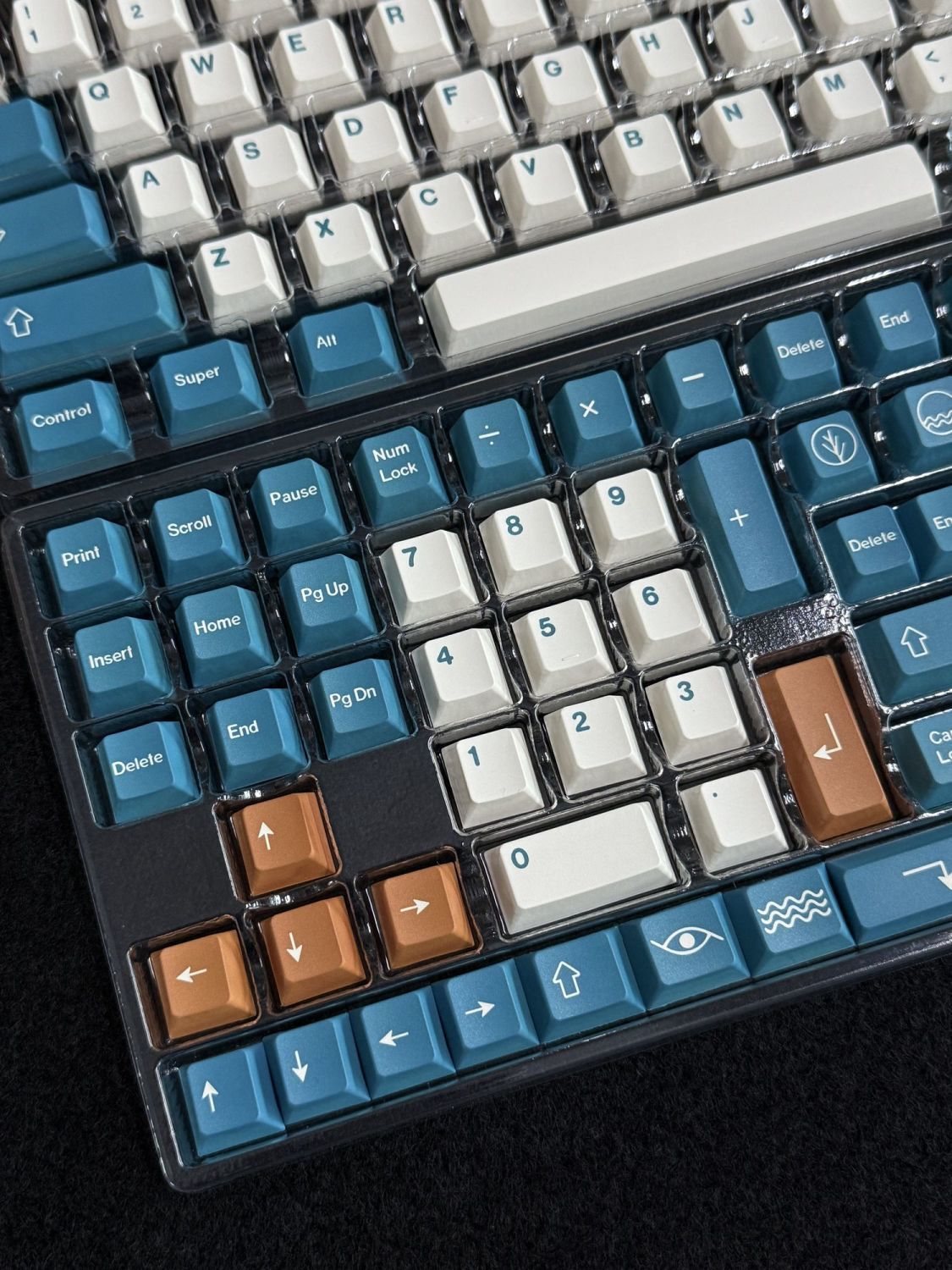 Close-up of Earth Tones Cherry Profile Keycaps Set on a black background