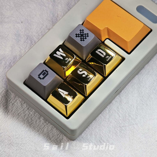 Metal Golden WASD Artisan Keycaps on Macropad