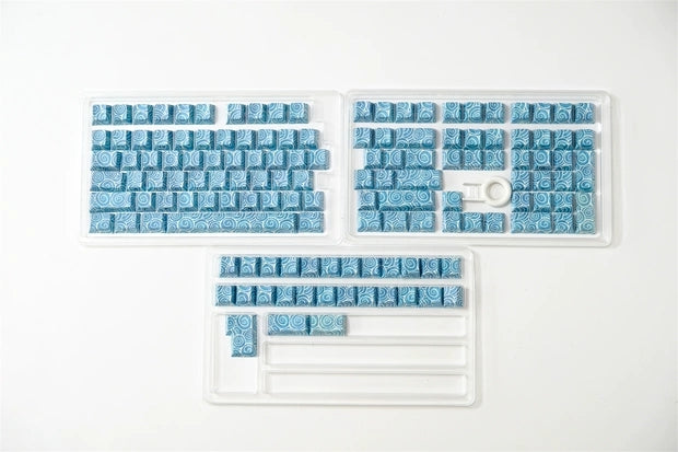 Ocean Swirl Side Engraved keycaps blister