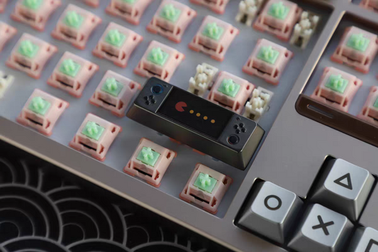 Pac Man Keycaps on a keyboard