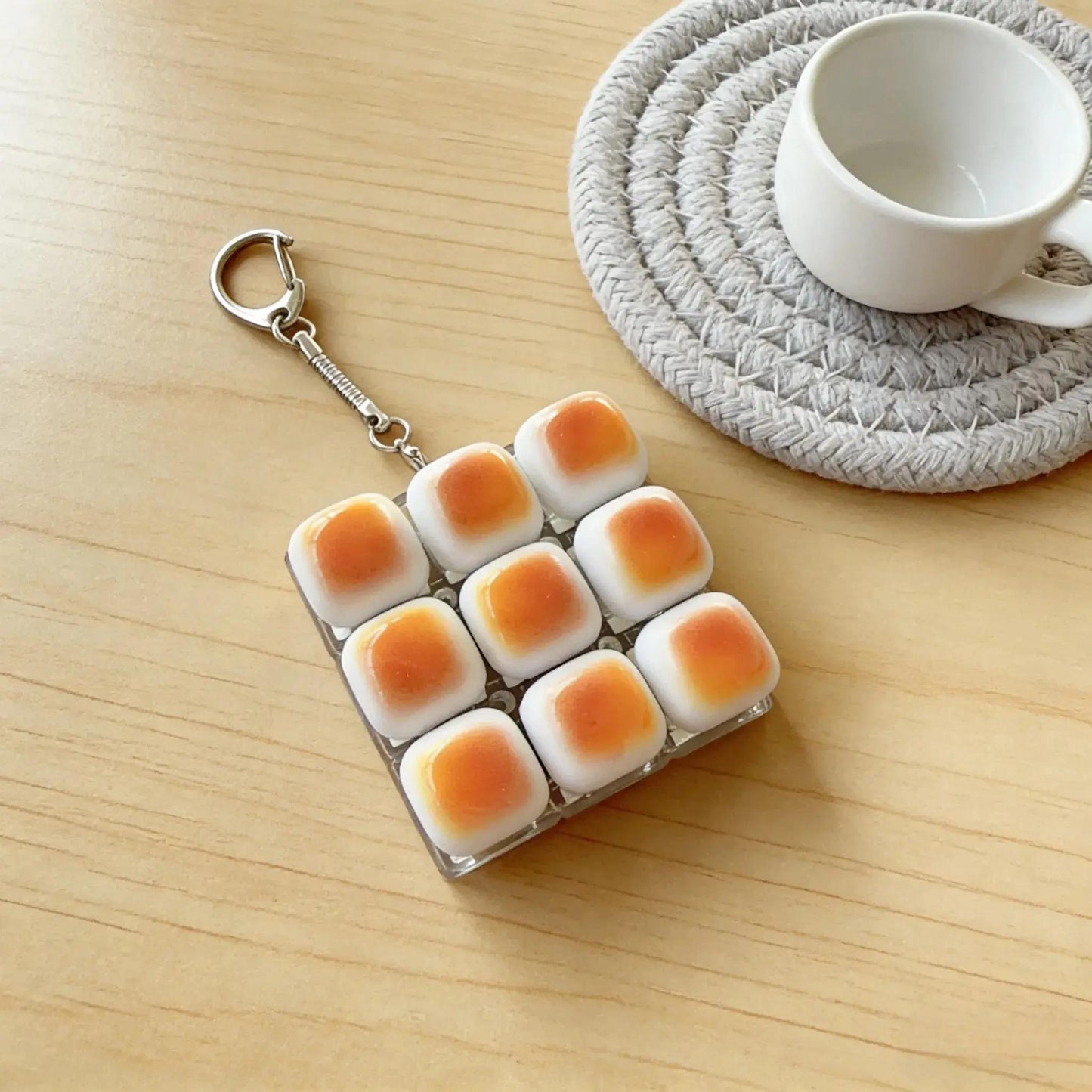 bun keycap fidget keychain on table
